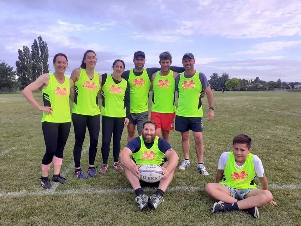 Team in Mangan Graphics hi-vis sports bibs